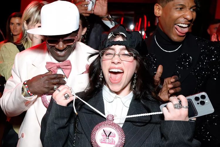 Flavor Flav Surprises Billie Eilish with Custom Barbie-Themed Clock Necklace at 2024 Vanity Fair Oscars Party